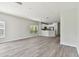Spacious dining area with wood-look flooring and large windows at 20461 Berrywood Ln, Tampa, FL 33647