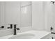 Modern bathroom featuring a white vanity and white tile at 11963 Richmond Trl, Parrish, FL 34219