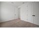 Bedroom with neutral carpet, and modern trim at 11963 Richmond Trl, Parrish, FL 34219