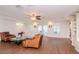 Spacious living room with hardwood floors and french doors at 9717 N Rome Ave, Tampa, FL 33612