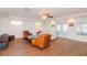 Spacious living room with hardwood floors and french doors at 9717 N Rome Ave, Tampa, FL 33612