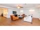 Spacious living room with hardwood floors and french doors at 9717 N Rome Ave, Tampa, FL 33612