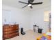 Home office with built-in shelving and hardwood flooring at 9717 N Rome Ave, Tampa, FL 33612