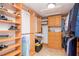 Large walk-in closet with ample shelving and hanging space at 9717 N Rome Ave, Tampa, FL 33612