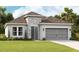 One-story house with stone accents and a two-car garage at 11963 Richmond Trl, Parrish, FL 34219