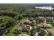 Aerial view of a house and neighborhood near a lake at 16637 Ashton Green Dr, Lutz, FL 33558