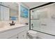 Updated bathroom with a tub/shower combo and modern vanity at 19725 Gulf Blvd # 33, Indian Shores, FL 33785