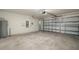 Spacious garage with automatic garage door at 16758 Sunburst Lake St, Wimauma, FL 33598