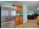 Stainless steel appliances and wood cabinetry highlight this kitchen at 2715 Bel Aire Cir, Tampa, FL 33614