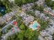 Aerial view highlighting property location near pool at 2200 Tuscany Trce # 21, Palm Harbor, FL 34683