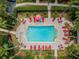 Relaxing rectangular pool with plenty of lounge chairs at 2200 Tuscany Trce # 21, Palm Harbor, FL 34683