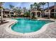 Enjoy this refreshing kidney-shaped pool with plenty of lounge chairs at 2200 Tuscany Trce # 21, Palm Harbor, FL 34683