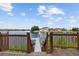 Water view from private dock with steps leading to a waterfront backyard at 1233 Acappella Ln, Apollo Beach, FL 33572
