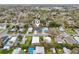 Charming neighborhood featuring a well-maintained home with lush landscaping and nearby community amenities at 272 Diogenes St, Dunedin, FL 34698