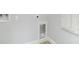 Utility connections for laundry appliances in an unfinished utility area at 272 Diogenes St, Dunedin, FL 34698
