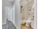 Modern bathroom with white tile and bathtub at 528 Islebay Dr, Apollo Beach, FL 33572