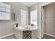 Relaxing bathroom with corner soaking tub and large window at 528 Islebay Dr, Apollo Beach, FL 33572