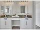Double vanity bathroom with granite countertops at 528 Islebay Dr, Apollo Beach, FL 33572