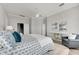Main bedroom with a large bed and stylish decor at 528 Islebay Dr, Apollo Beach, FL 33572