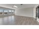 Spacious bonus room with wood-look floors and large windows at 528 Islebay Dr, Apollo Beach, FL 33572