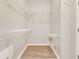 Spacious walk-in closet with wire shelving units at 528 Islebay Dr, Apollo Beach, FL 33572