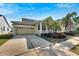 Two story house with attached garage and manicured landscaping at 528 Islebay Dr, Apollo Beach, FL 33572