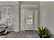Bright entryway with white doors and gray walls at 528 Islebay Dr, Apollo Beach, FL 33572