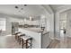 Modern kitchen with white cabinets and granite countertops at 528 Islebay Dr, Apollo Beach, FL 33572