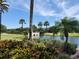 Scenic lake with bridge and lush landscaping at 528 Islebay Dr, Apollo Beach, FL 33572