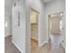 Bright laundry room with white cabinets and vinyl flooring at 528 Islebay Dr, Apollo Beach, FL 33572