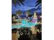 Night view of resort-style pool with lighthouse at 528 Islebay Dr, Apollo Beach, FL 33572