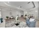 Open living room featuring hardwood floors and ample natural light at 528 Islebay Dr, Apollo Beach, FL 33572