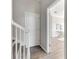 White railing staircase leading to the second floor at 528 Islebay Dr, Apollo Beach, FL 33572