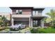 Modern two-story house with a gray exterior and a two-car garage at 5221 29Th S Ave, St Petersburg, FL 33707