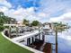 Private boat dock with covered slips and waterfront access at 166 Baltic Cir, Tampa, FL 33606