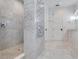 Bright bathroom with a large walk in marble shower and built-in bench at 166 Baltic Cir, Tampa, FL 33606