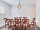 Formal dining room with wood table and chairs, hardwood floors at 166 Baltic Cir, Tampa, FL 33606