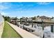 Private wooden dock with multiple boat slips at 528 Islebay Dr, Apollo Beach, FL 33572