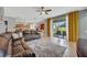 Gathering room with sliding glass doors leading to the backyard at 10820 Carloway Hills Drive, Wimauma, FL 33598