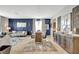 Open concept dining area with blue wall at 10820 Carloway Hills Drive, Wimauma, FL 33598
