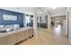 Open living and dining area with tiled floors at 10820 Carloway Hills Drive, Wimauma, FL 33598