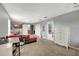 Multipurpose bedroom with a couch, desk, and ample storage at 10820 Carloway Hills Drive, Wimauma, FL 33598