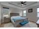 Spacious main bedroom with a large bed and ceiling fan at 2860 14Th N Ave, St Petersburg, FL 33713