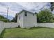 Private backyard with grassy area and white vinyl fence at 2860 14Th N Ave, St Petersburg, FL 33713