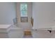 Modern staircase with light walls and framed artwork at 2860 14Th N Ave, St Petersburg, FL 33713
