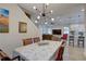 Bright dining room with a wooden table, and view into the living room at 2860 14Th N Ave, St Petersburg, FL 33713