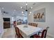 Bright dining room with a wood table and chairs, overlooking the living room at 2860 14Th N Ave, St Petersburg, FL 33713