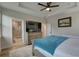 Main bedroom with ensuite bathroom and large TV at 2860 14Th N Ave, St Petersburg, FL 33713