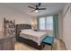 Serene bedroom with a plush bed, bookshelf, and window at 2860 14Th N Ave, St Petersburg, FL 33713