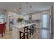 Modern kitchen with white cabinets, stainless steel appliances and breakfast bar seating at 2860 14Th N Ave, St Petersburg, FL 33713
